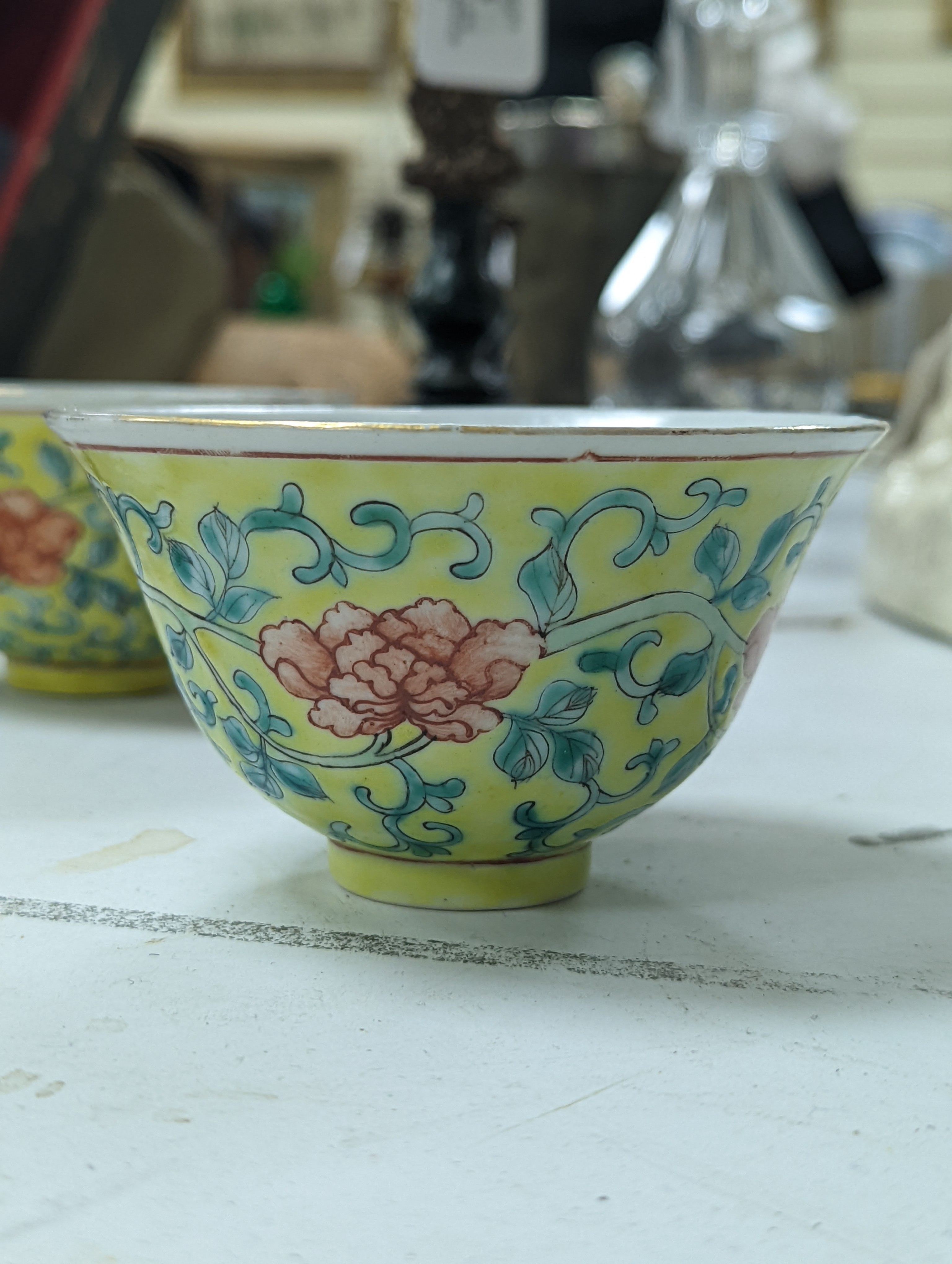 A group of Chinese porcelain, 19th /20th century, to include a pair of yellow ground bowls, 10.8 cm diameter, a blue and white vase, Xuande mark, a similar bowl and vase, and a champleve enamel bronze koro and cover